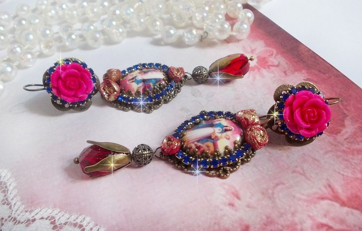 BO Maria og Jesus laget med harpiks cabochons, røde fasetterte pærer og diverse tilbehør