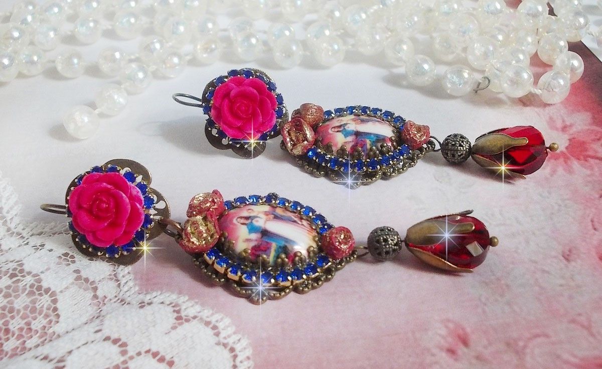 BO Maria og Jesus laget med harpiks cabochons, røde fasetterte pærer og diverse tilbehør