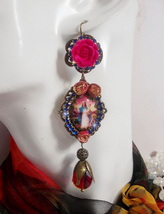 BO Maria og Jesus laget med harpiks cabochons, røde fasetterte pærer og diverse tilbehør