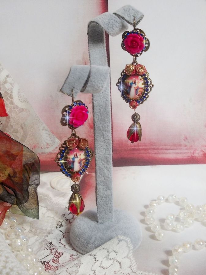 BO Maria og Jesus laget med harpiks cabochons, røde fasetterte pærer og diverse tilbehør