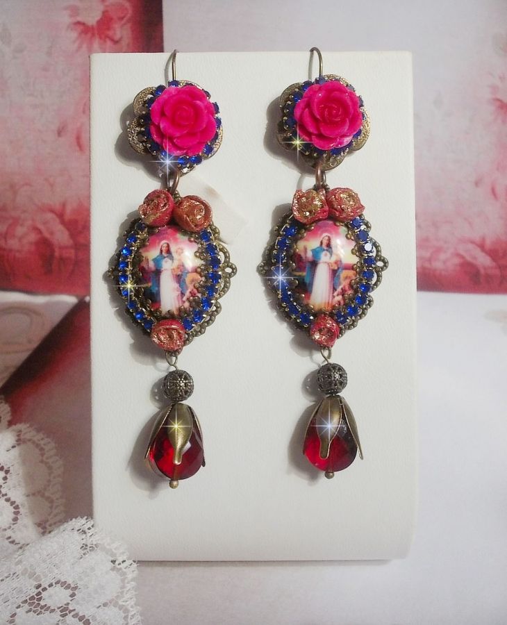 BO Maria og Jesus laget med harpiks cabochons, røde fasetterte pærer og diverse tilbehør
