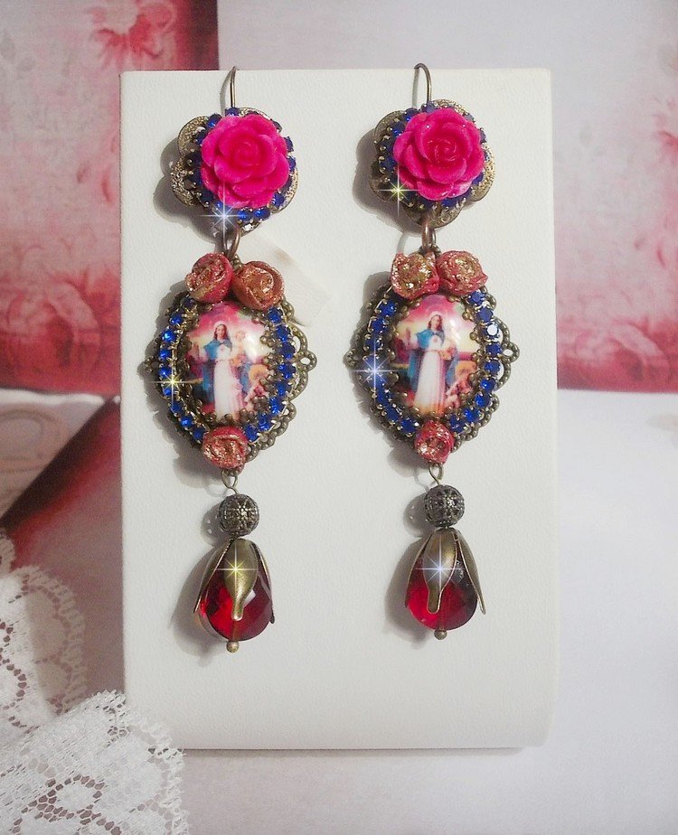 BO Maria og Jesus laget med harpiks cabochons, røde fasetterte pærer og diverse tilbehør