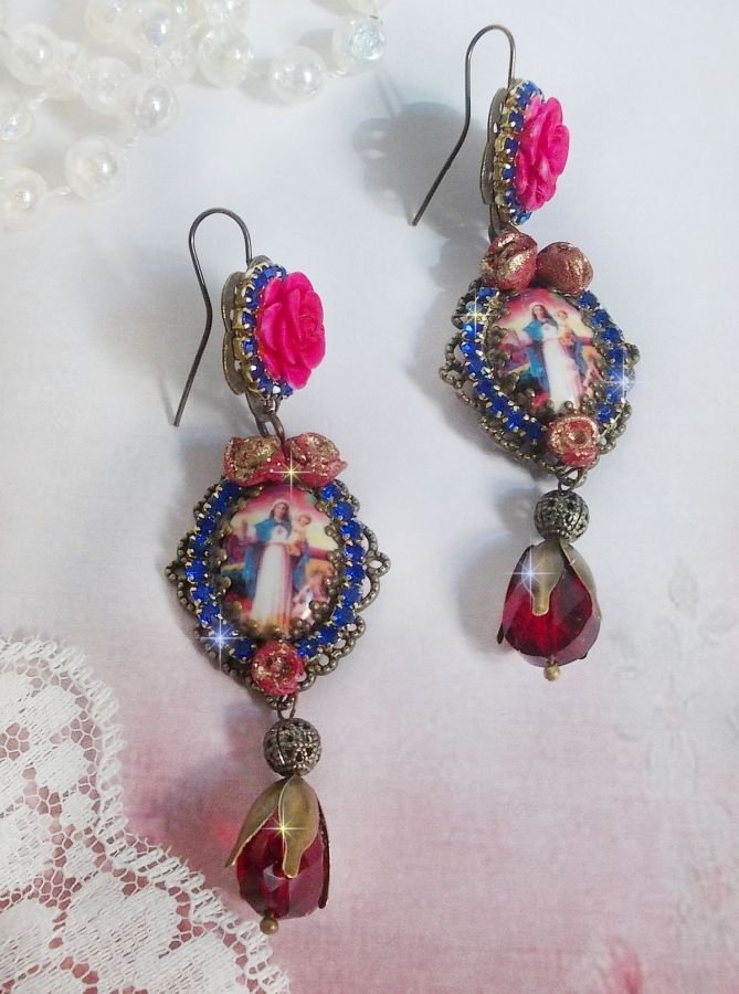 BO Maria og Jesus laget med harpiks cabochons, røde fasetterte pærer og diverse tilbehør