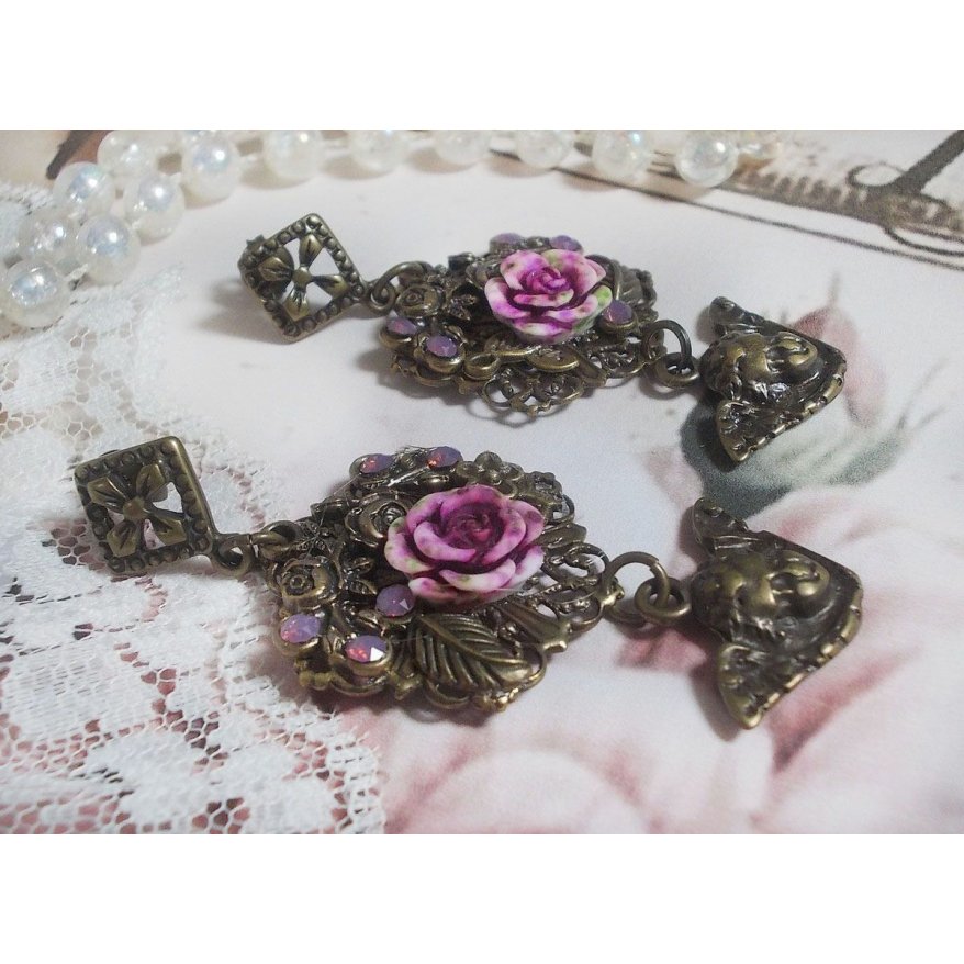 BO Secrets des Angelots laget med harpiksroser, Angelot-charms, trykk og krystaller