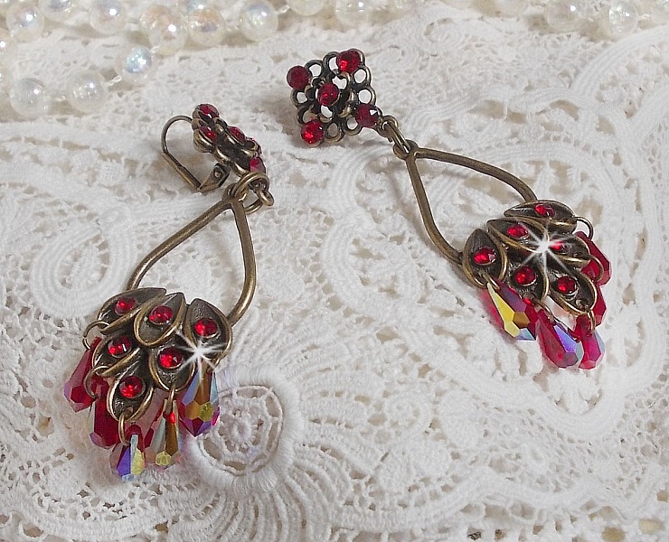 BO Irresistible Ruby Collection montert p&aring; lysestaker med Swarovskikrystaller.