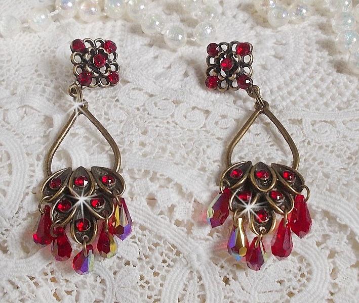 BO Irresistible Ruby Collection montert p&aring; lysestaker med Swarovskikrystaller.