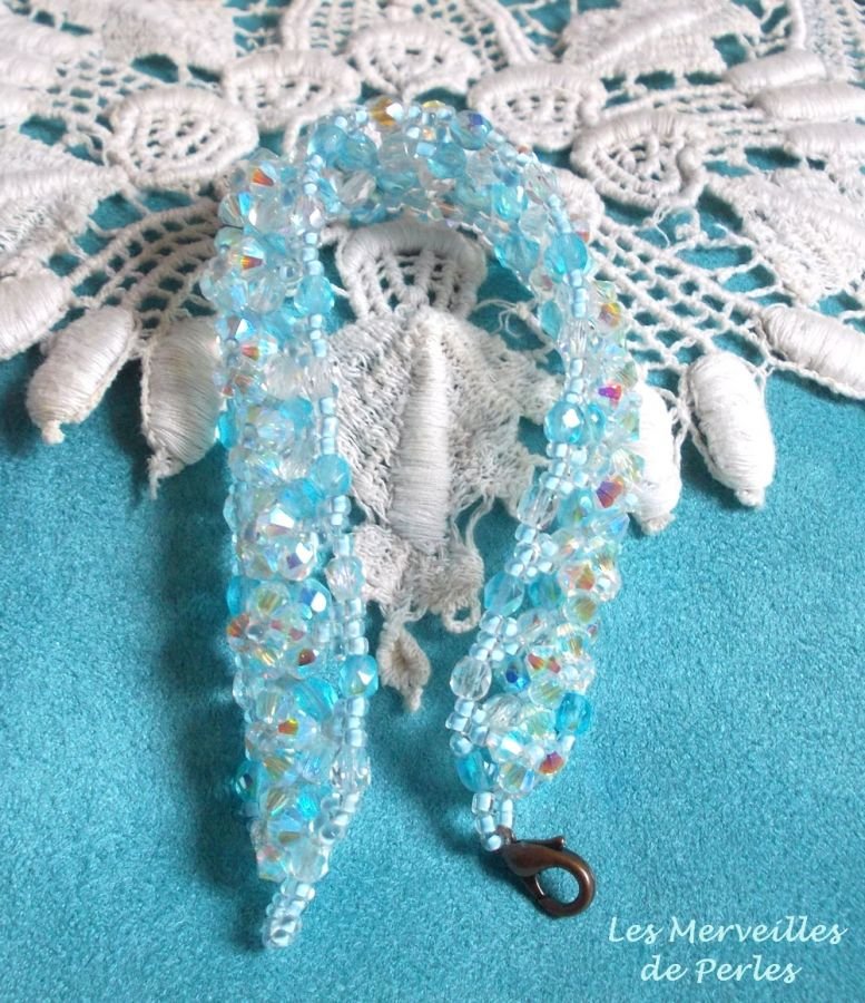 Crystal Blue armbånd med Swarovski krystallfasetter og spinnere