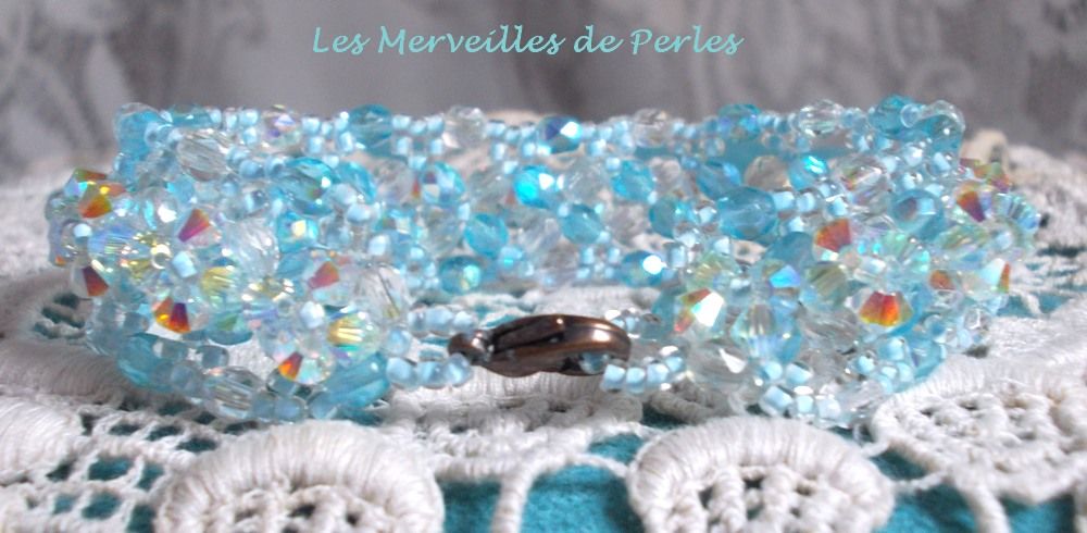 Crystal Blue armbånd med Swarovski krystallfasetter og spinnere