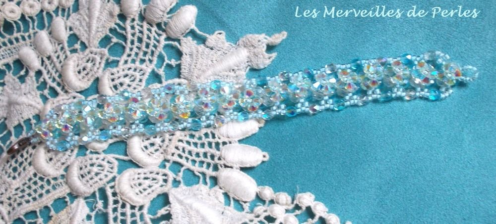 Crystal Blue armbånd med Swarovski krystallfasetter og spinnere