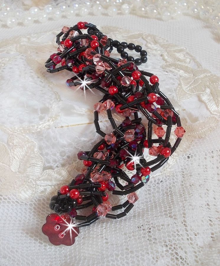 Følelsesarmbånd med rørperler, perlemorperler og snurretopper av Swarovski-krystall
