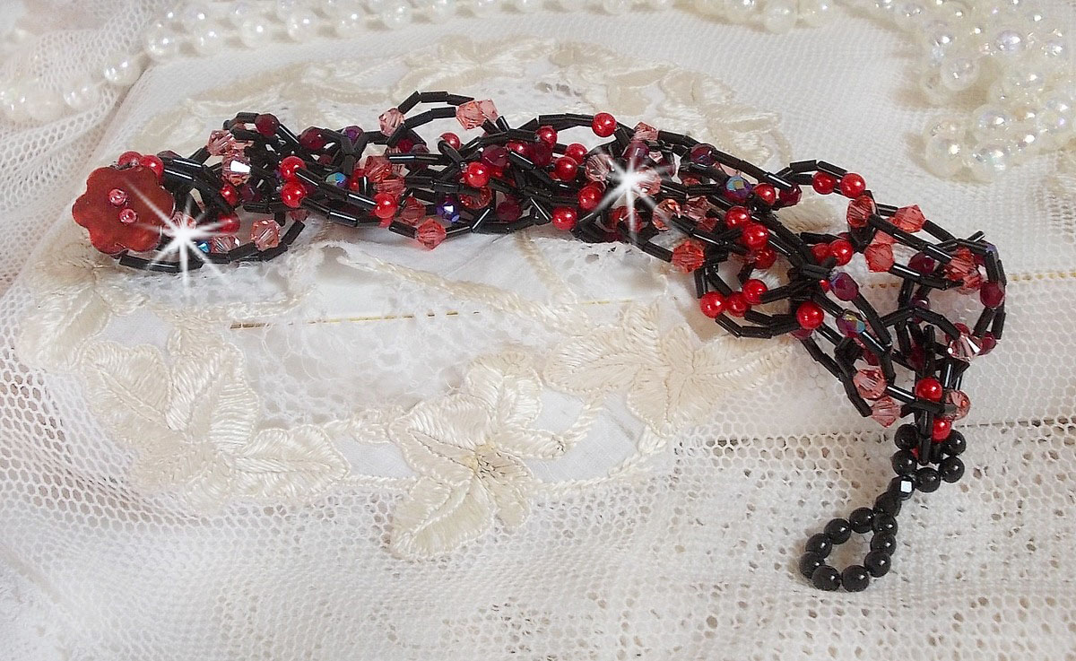 Følelsesarmbånd med rørperler, perlemorperler og snurretopper av Swarovski-krystall