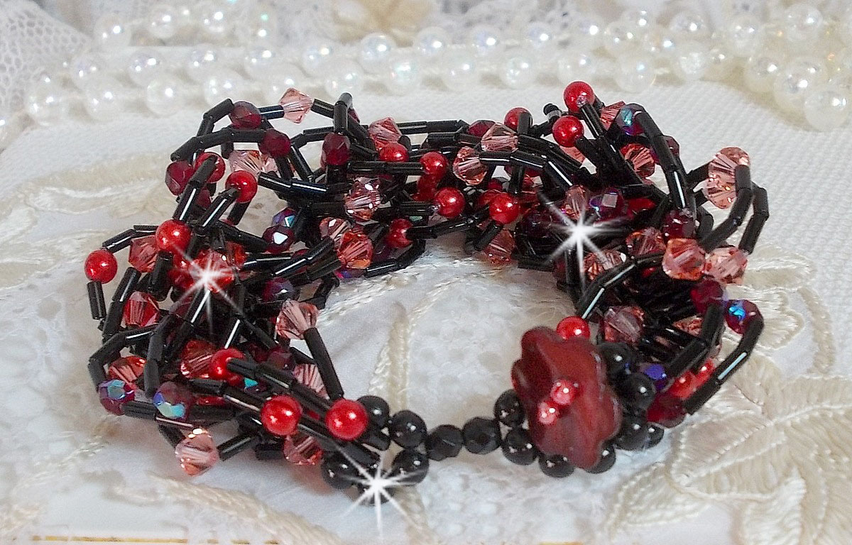 Følelsesarmbånd med rørperler, perlemorperler og snurretopper av Swarovski-krystall