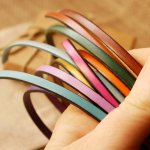 Mansjettarmbånd i et utvalg av 4 skinntyper