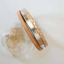 Mansjettarmbånd i naturskinn og sølvfarget skinn til dame 
