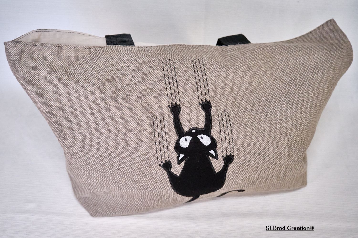 Sac cabas chat et ses traces de griffes